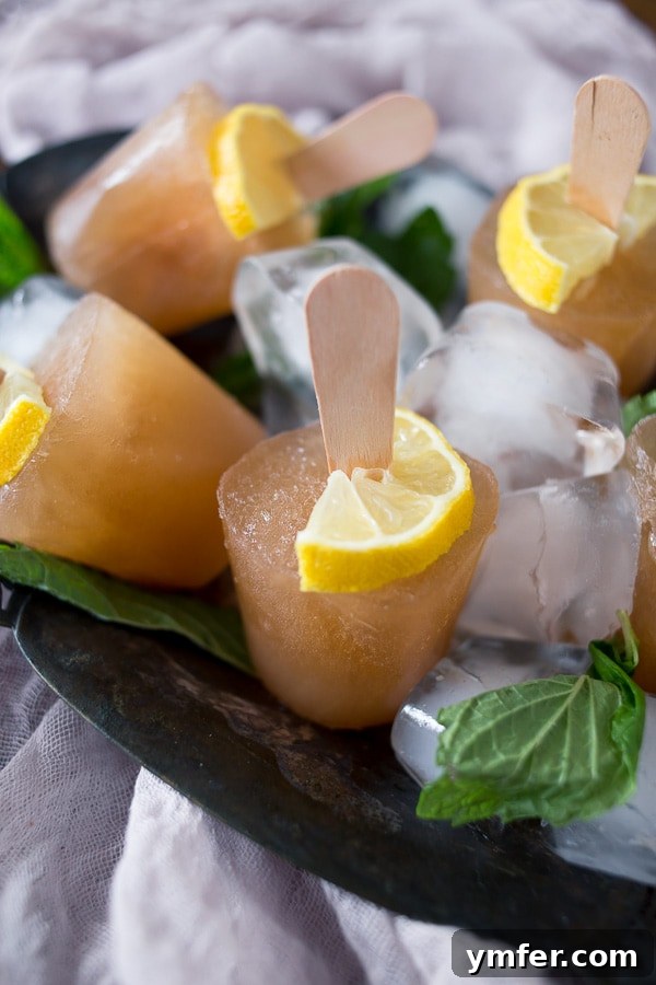 Southern Tea Pops 2 Refreshing Sweet Tea Popsicles with lemon and mint on a hot summer day