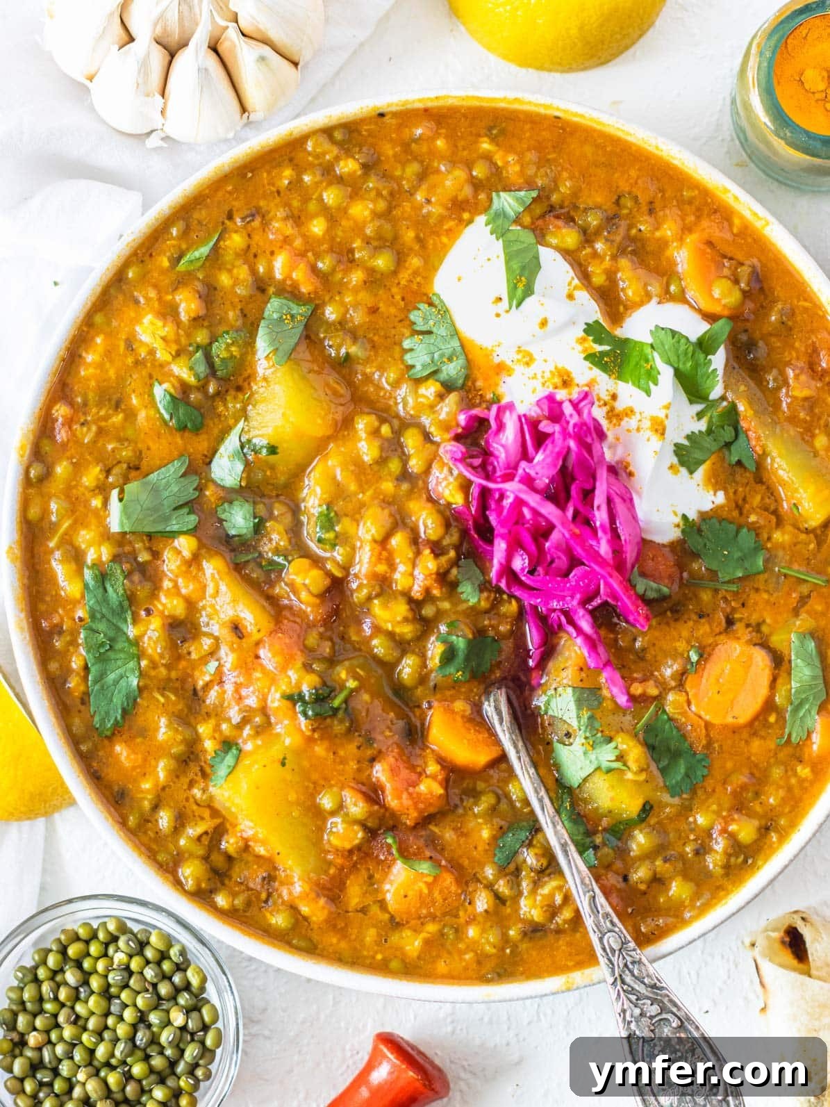 Jade Bean Elixir 2 Mung bean soup with yogurt and pickled red cabbage, ready to be served