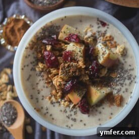 This apple pie smoothie bowl tastes just like apple pie without all the calories found in traditional dessert. It's topped with fresh cut apples, apple pie spice, granola, chia seeds and dried cranberries. This is the perfect way to start your day!