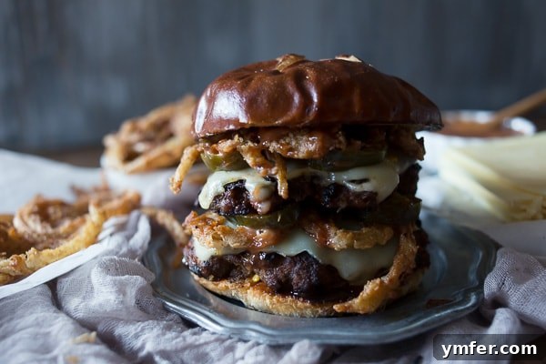 Crispy Onion Chorizo Burgers 4 This chorizo beef burger with crispy onion straws is the perfect big mouth burger. Topped with bbq fry sauce, candied jalapeños and American cheese.