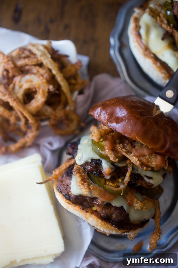 Crispy Onion Chorizo Burgers 5 This chorizo beef burger with crispy onion straws is the perfect big mouth burger. Topped with bbq fry sauce, candied jalapeños and American cheese.