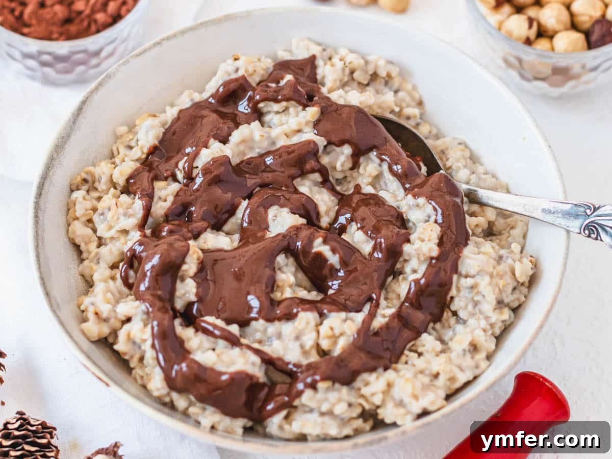 25 Power-Packed High Protein Vegan Breakfasts 12 hazelnut spread on oatmeal with chia seeds in a white bowl