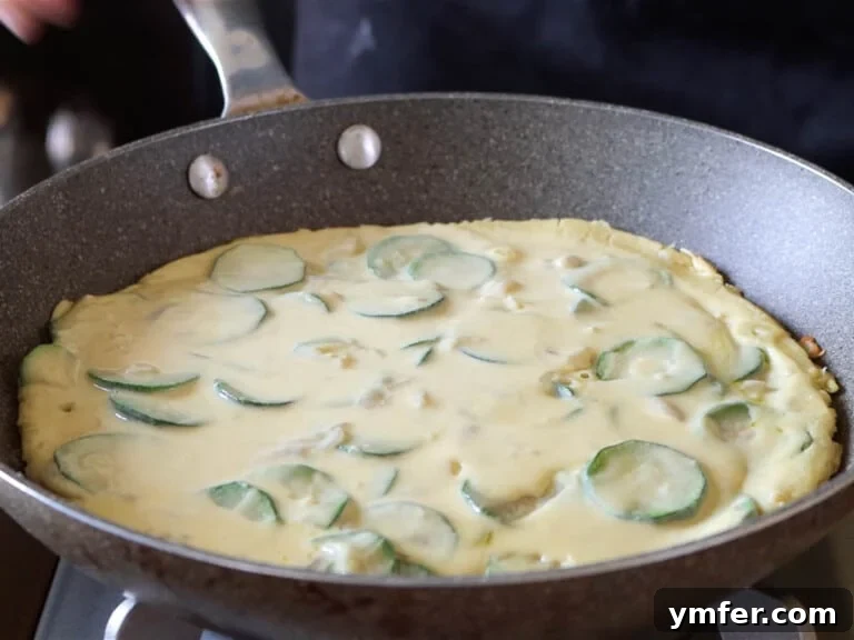 25 Power-Packed High Protein Vegan Breakfasts 25 frittata batter on a pan