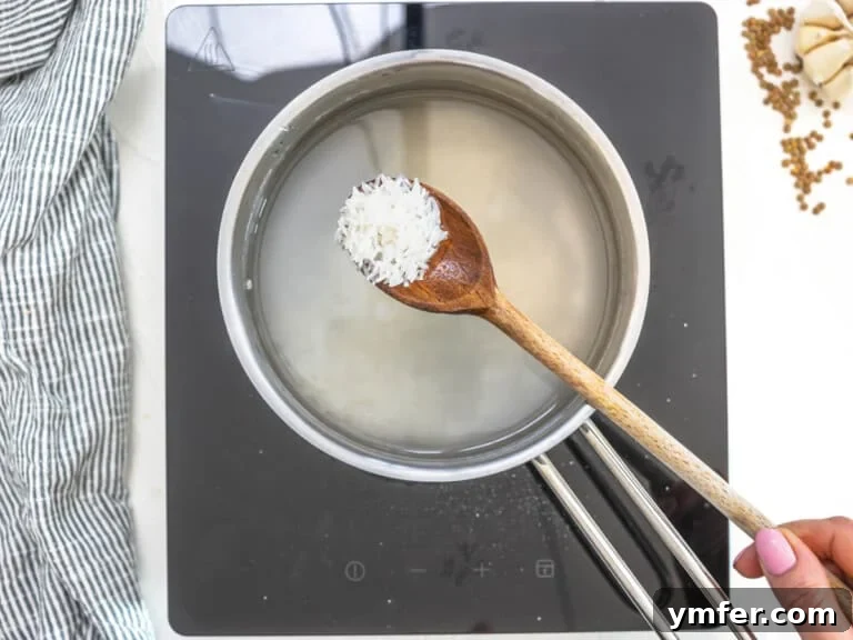 basmati rice cooking in a pot with water