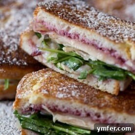 This turkey monte cristo is made with cranberry sauce, arugula, leftover turkey and Swiss cheese. Perfectly grilled and gluten free! This is the perfect sandwich for using up all those Thanksgiving leftovers!