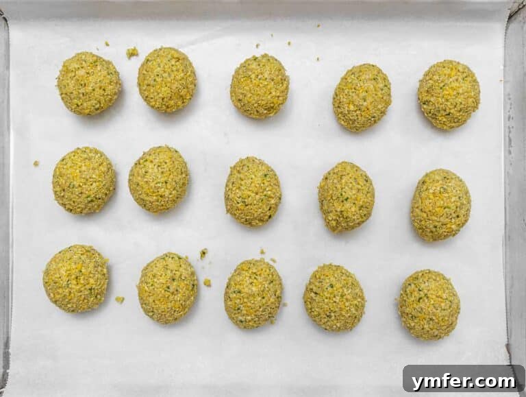 Creative Chickpea Flour Cuisine 26 Falafel balls on a baking tray