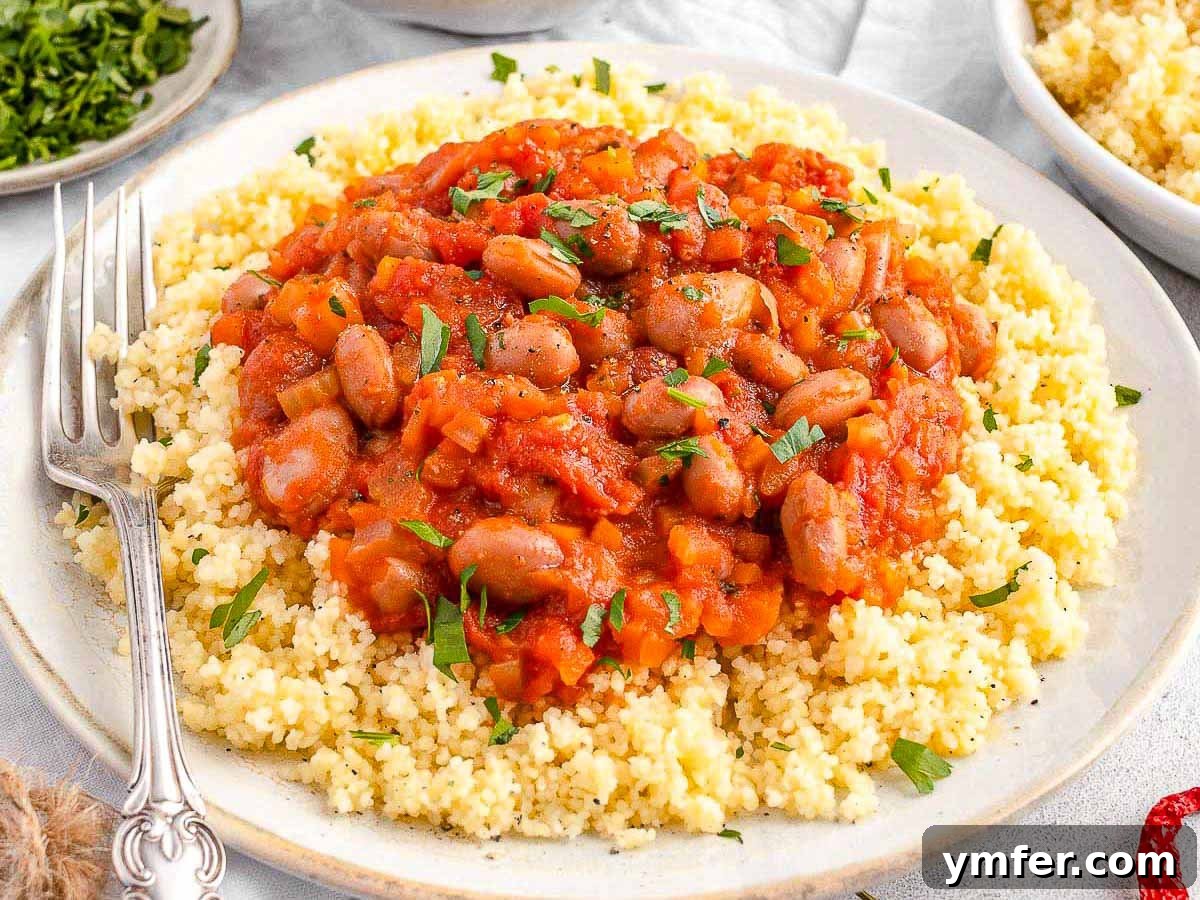 15 Quick and Easy Cannellini Bean Dishes 14 Italian bean stew served with couscous and a fork, a wholesome and adaptable dish