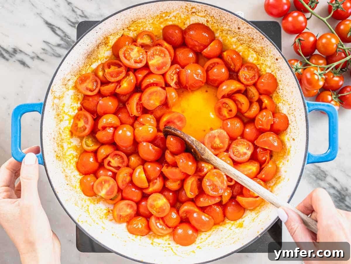 Paccheri: Italy's Grand Tubes 9 cherry tomatoes in a blue skillet