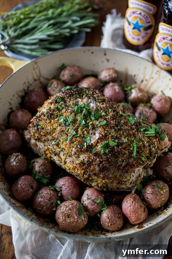 Golden Herb Citrus Pork Roast 4 This citrus herb crusted pork roast is perfect for the holidays. Rubbed down with flavor packed topping and roasted with small baby potatoes. Easy and delicious!
