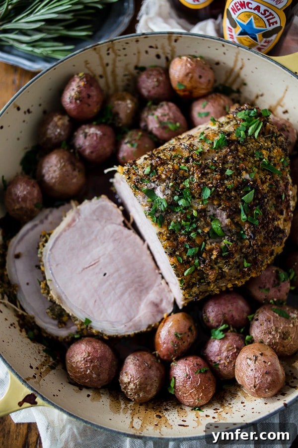 Golden Herb Citrus Pork Roast 5 This citrus herb crusted pork roast is perfect for the holidays. Rubbed down with flavor packed topping and roasted with small baby potatoes. Easy and delicious!
