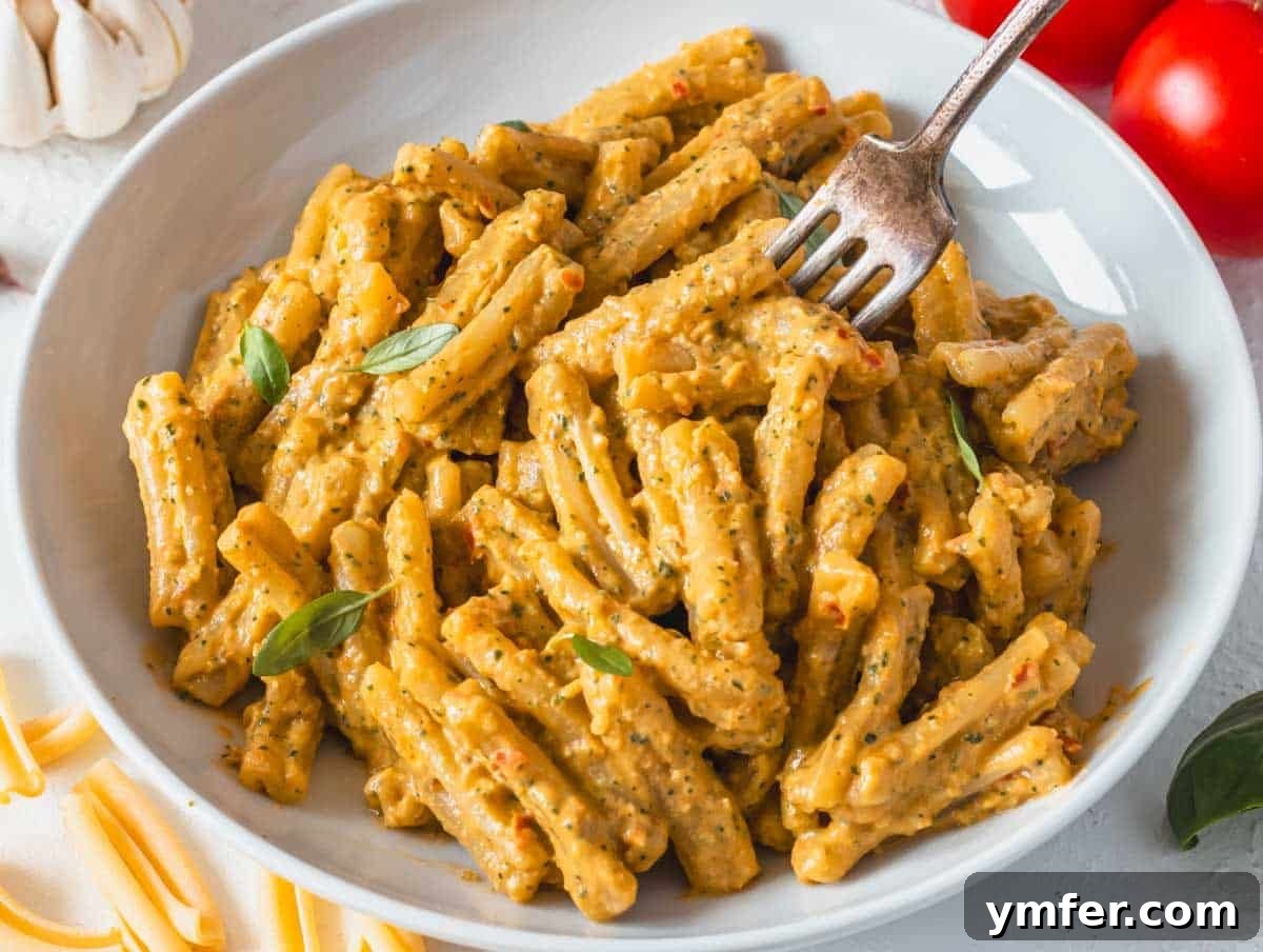 Sicilian Red Pesto 10 Creamy red tomato pasta in a white bowl