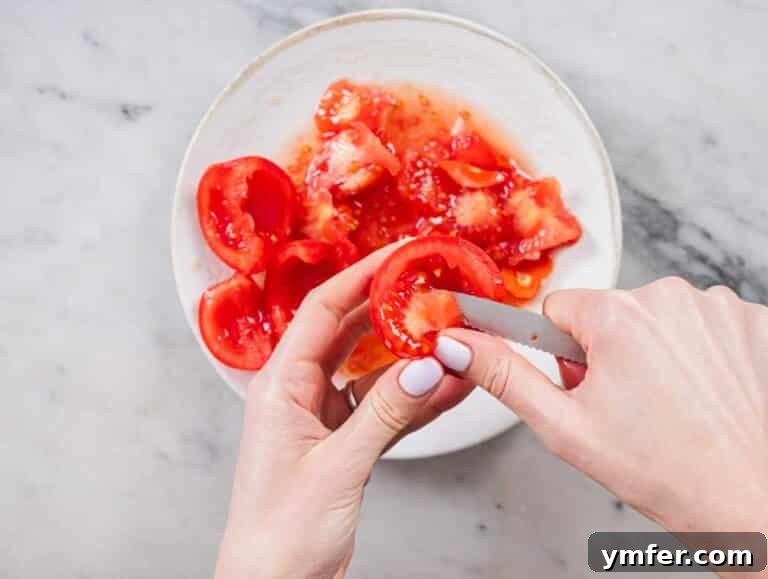 Sicilian Red Pesto 15 removing the seeds from vine tomatoes with a pairing knife